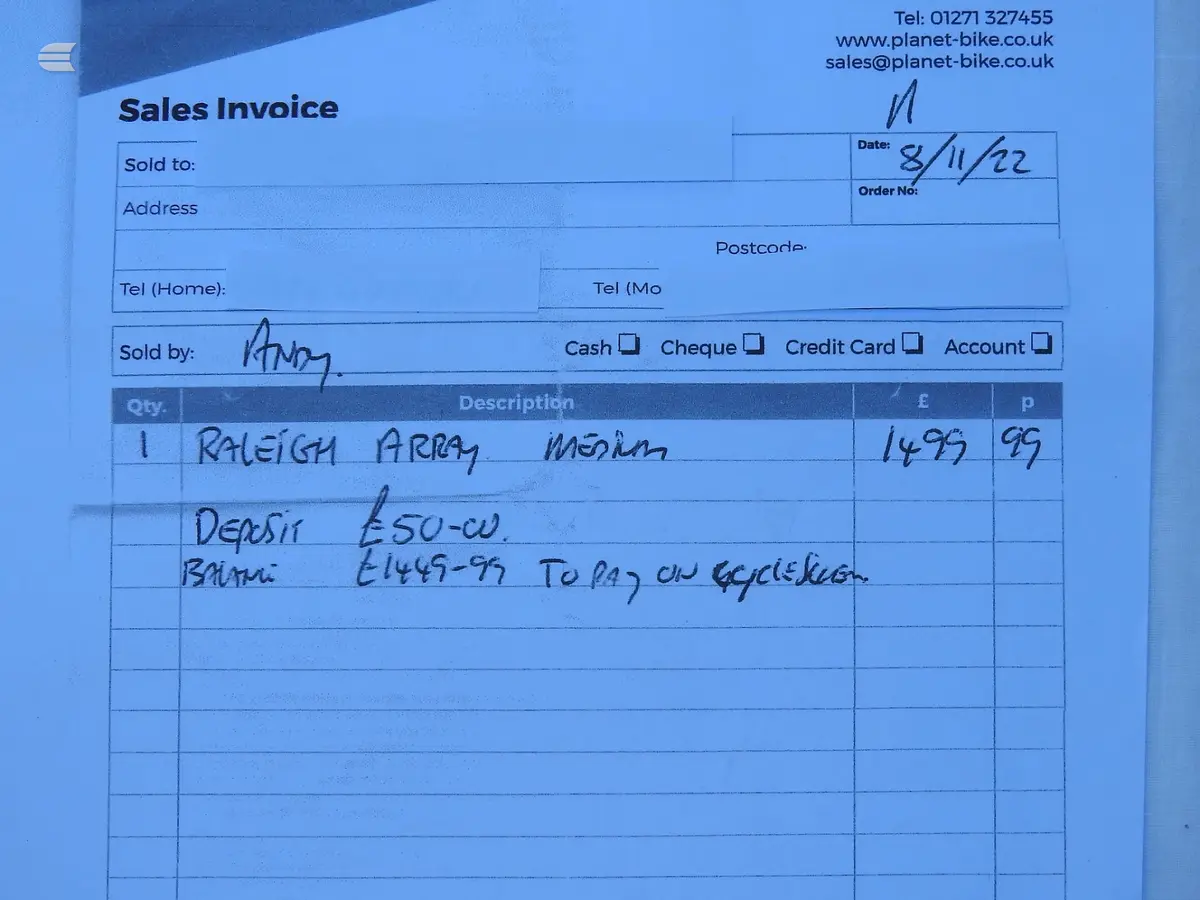 Sales invoice from Planet Bike, dated 8/11/22, showing handwritten details of a Raleigh Array Medium bike sale for £1,499.99 with deposit and balance payment