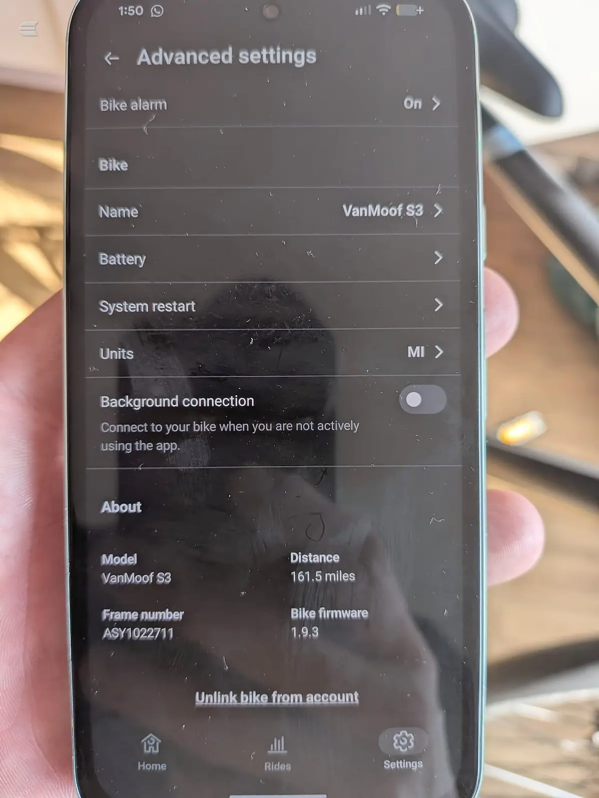 Smartphone screen displaying Advanced settings menu for a VanMoof S3 e-bike, showing bike alarm, name, battery, system restart, units, background connection,